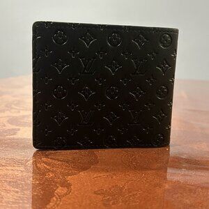 PRE-OWNED Louis Vuitton Black Monogram Embossed Leather Wallet